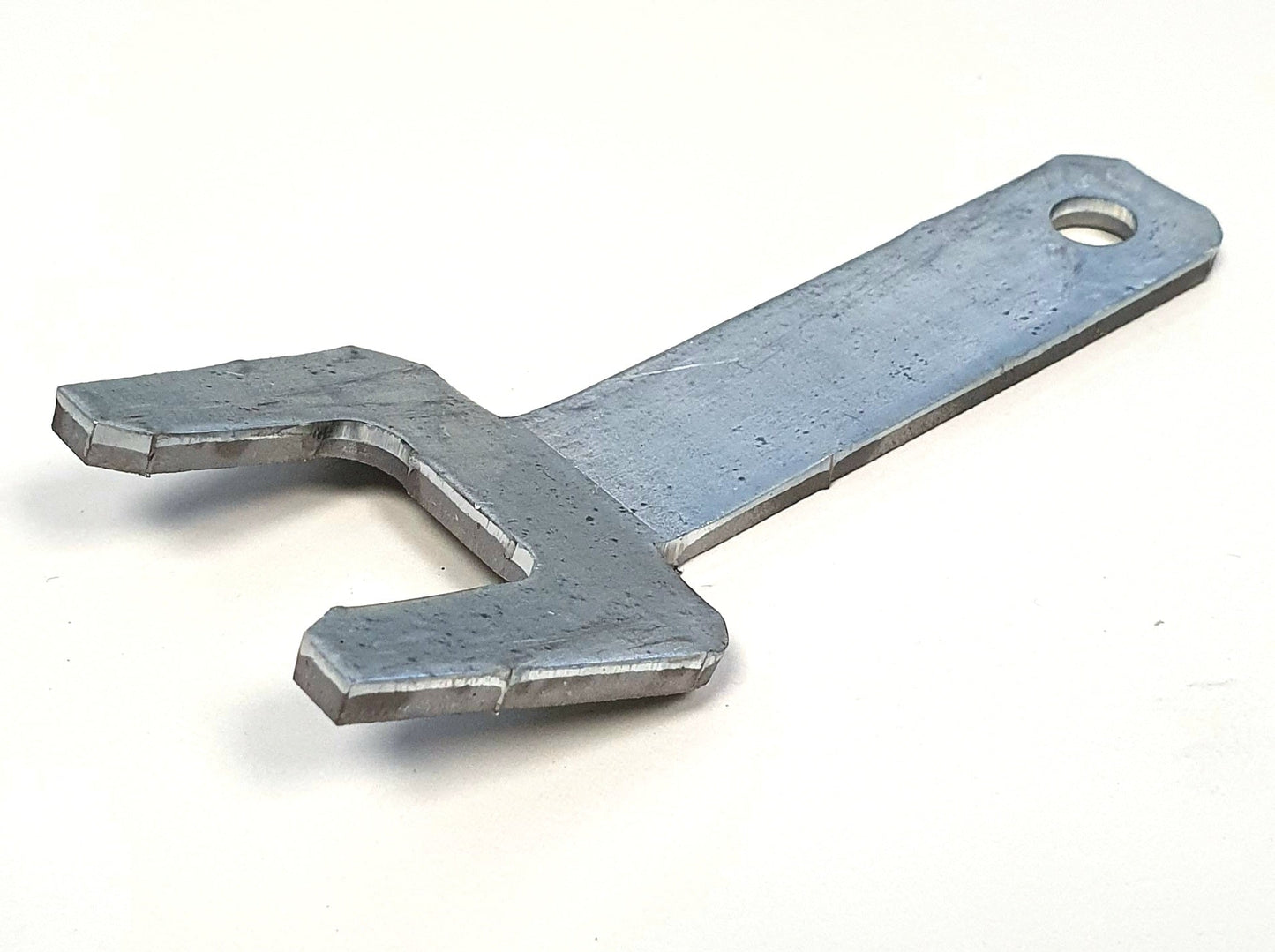 Spezialschlüssel zum Gegenhalten der Lauf- und Stützrollen